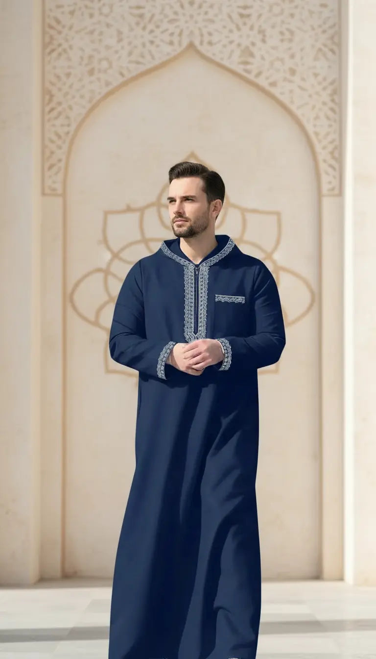 Azlan Signature navy blue men’s thobe by Rayyan & Co. with structured neckline and elegant Islamic menswear design
