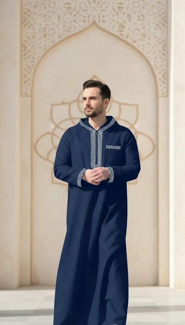 Azlan Signature navy blue men’s thobe by Rayyan & Co. with structured neckline and elegant Islamic menswear design