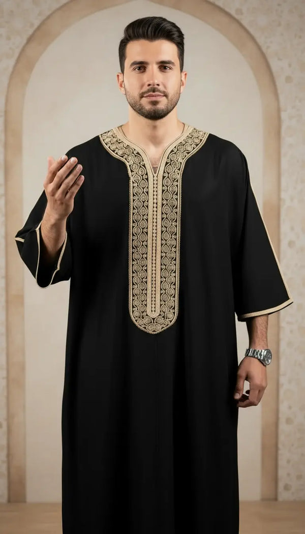 Imran Elite black embroidered men’s thobe by Rayyan & Co. with elegant gold detailing